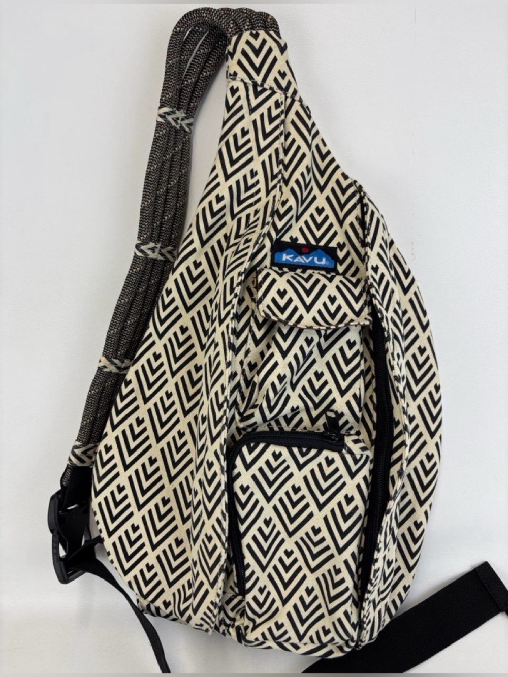 KAVA sling backpack EUC Black/White